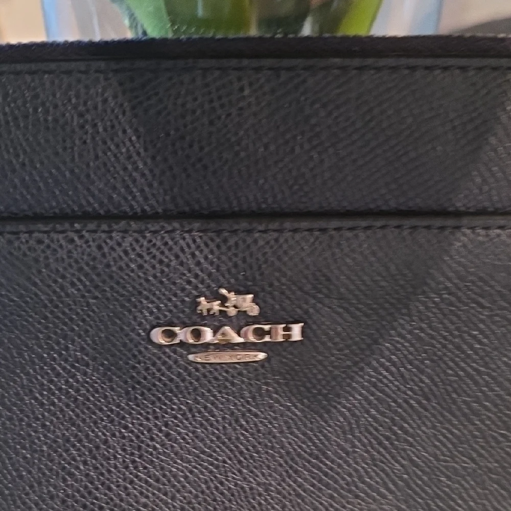 Coach sleek black